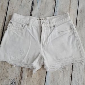 Free people button fly white jean shorts, fringed